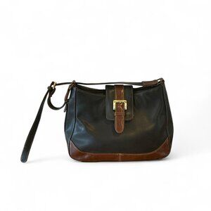 Black and brown faux leather shoulder bag with adjustable strap